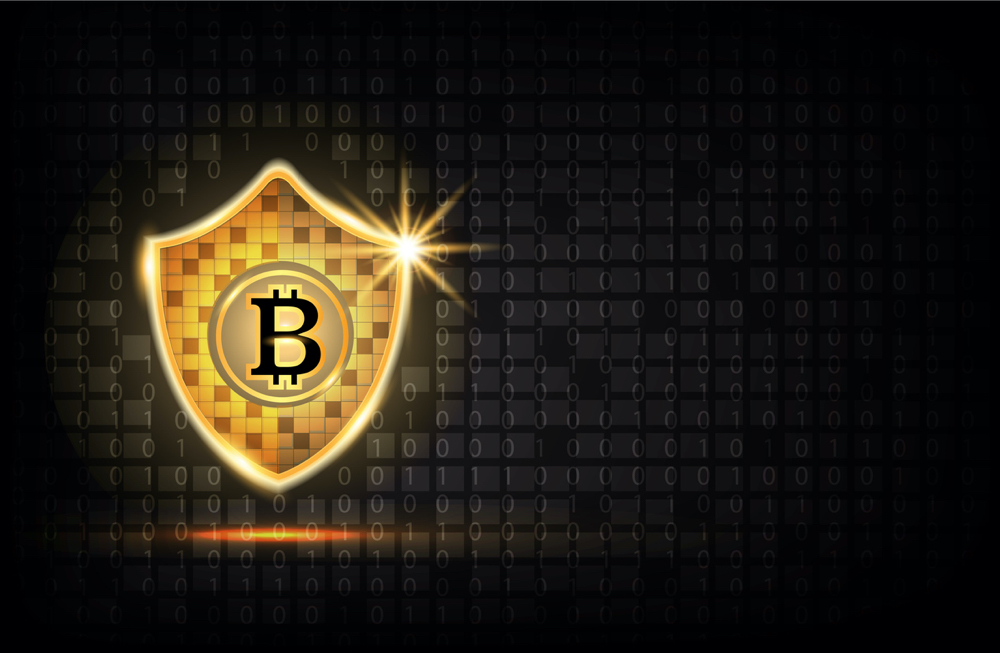 Golden shield with Bitcoin icon background